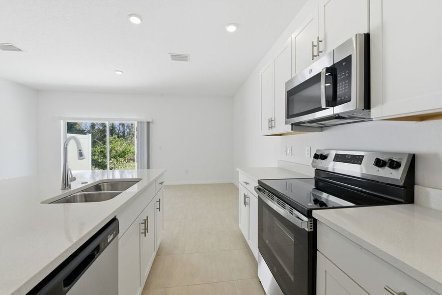 Furnished interior view inside a new home in Vinterra Townhomes, Nokomis (Image 4).