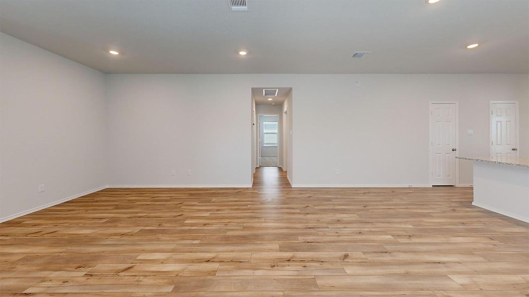 Unfurnished room with recessed lighting and light wood-style flooring