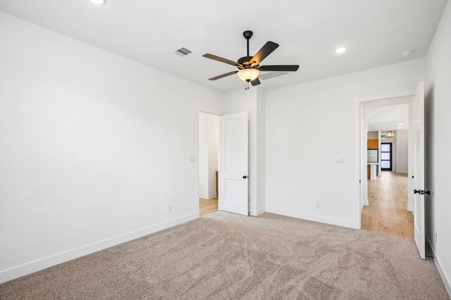 Spacious, unfurnished interior of a new home in The Trails 50's, New Caney (Image 22).