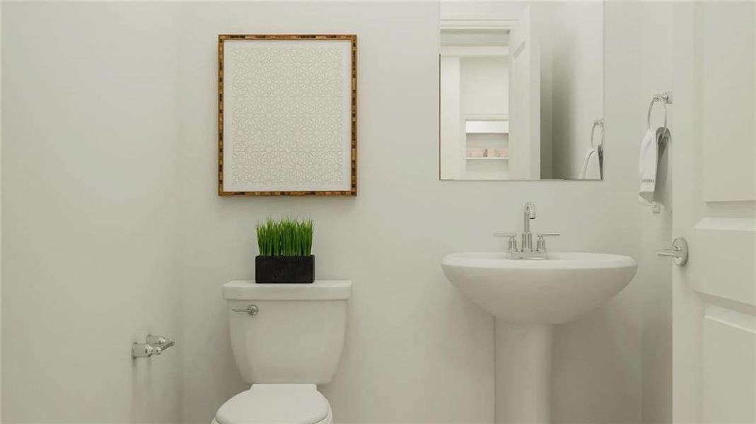 Pedestal sink with chrome-finish faucet, white toilet, and recessed mirror Pedestal sink with chrome-finish faucet, white toilet, and recessed mirror