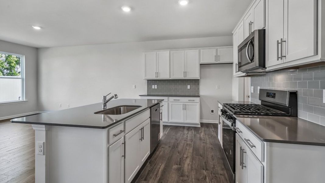 Furnished interior view inside a new home in Chapel Townes, Raleigh (Image 8). Furnished interior view inside a new home in Chapel Townes, Raleigh (Image 8).