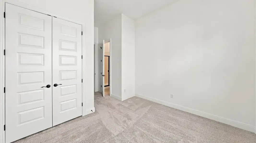 Furnished interior view inside a new home in Oaks at San Gabriel, Georgetown (Image 14).