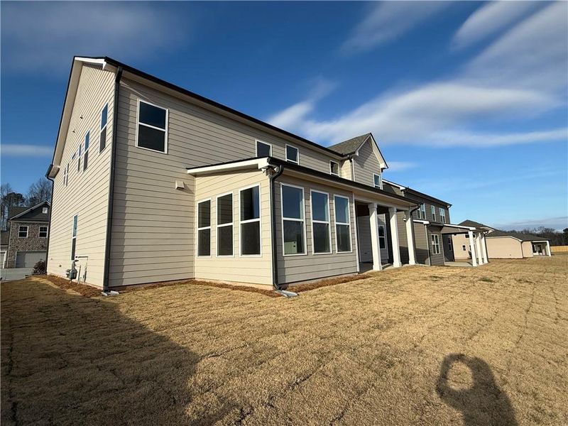Exterior details and patio area of a home in Ponderosa Farms Manor, Gainesville (Image 4).