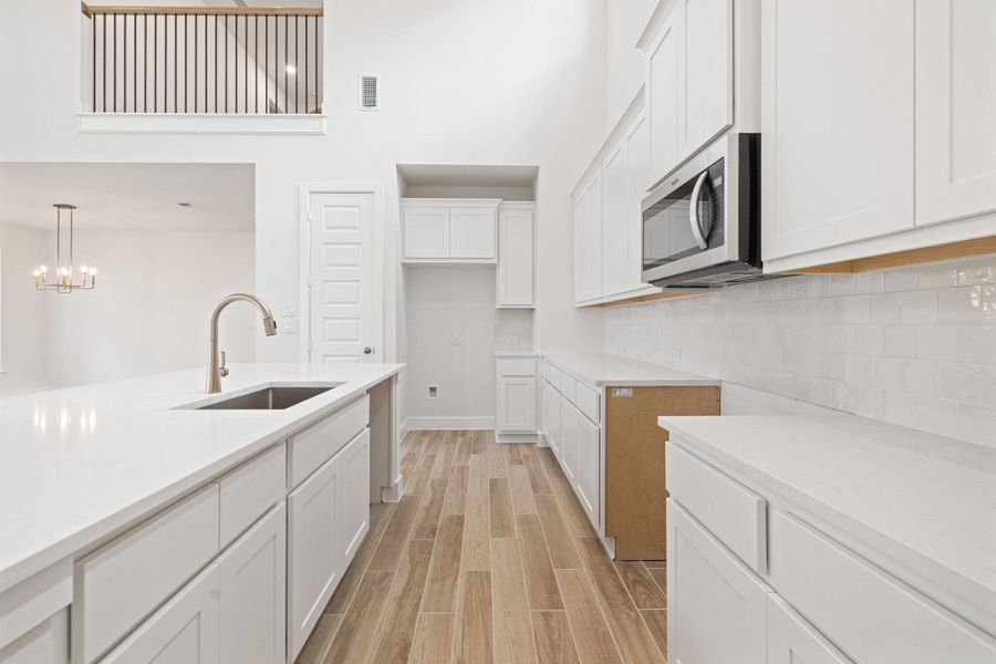 Furnished interior view inside a new home in Parmer Ranch, Georgetown (Image 6).