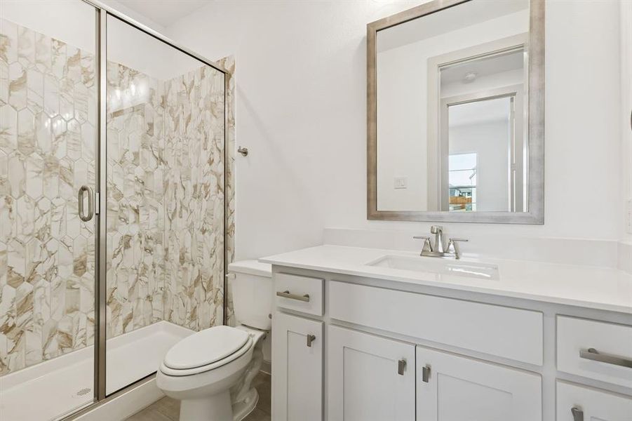 Friends and family will feel right at home in any of the beautifully finished guest baths offered in our Versailles II plan.