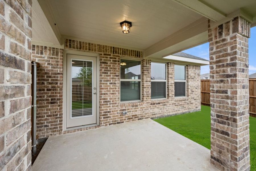 Representative exterior photo of a completed home built from the Jarvis by Impression Homes in Redden Farms, Midlothian, TX (Image 27).