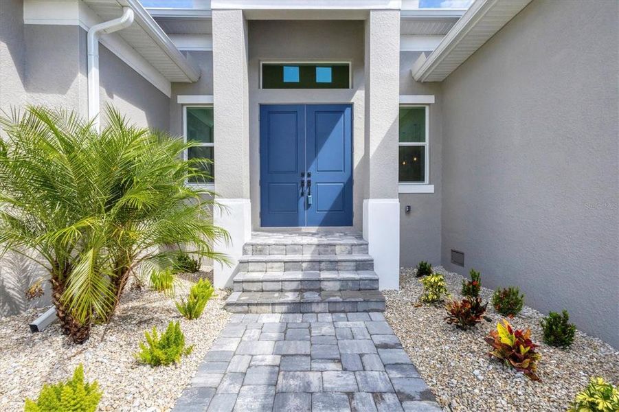 Front exterior of a new home in , Port Charlotte, FL, highlighting curb appeal (Image 19).