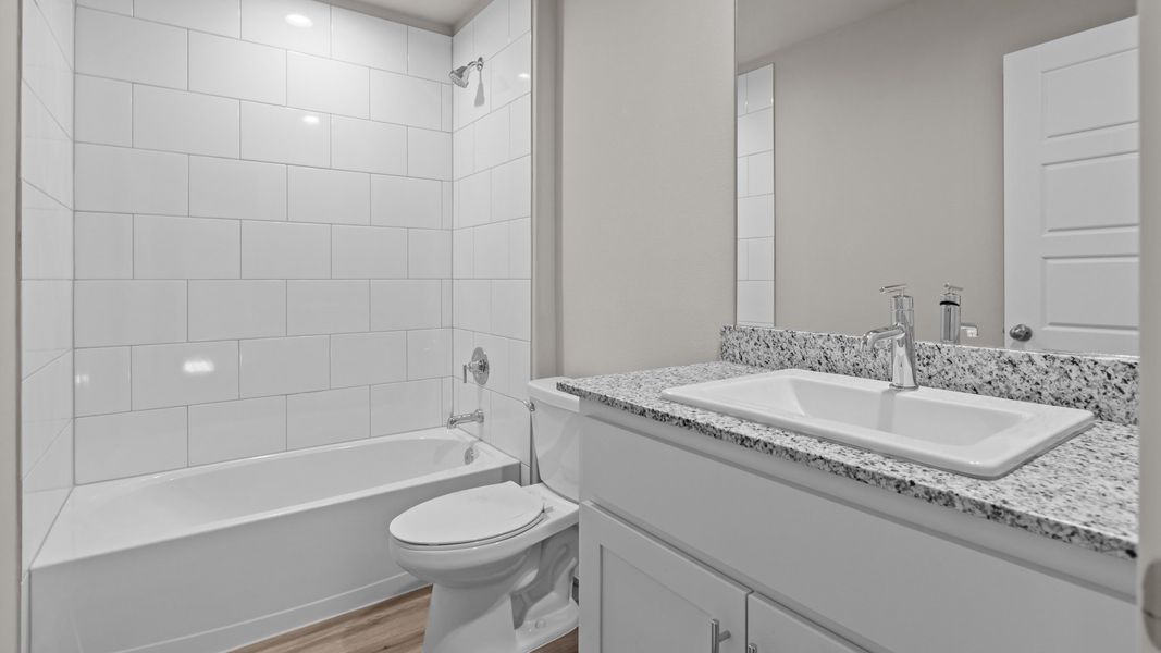 Representative furnished interior of a home built from the NAPLES by D.R. Horton in Homestead at Parks Bell Ranch, Odessa (Image 21).