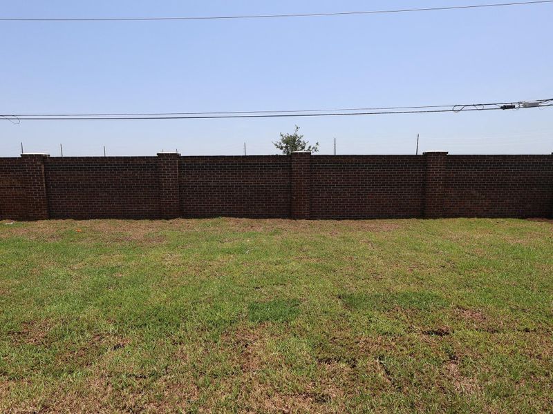 Exterior details and patio area of a home in Hallimore Ranch, Rosenberg (Image 20).