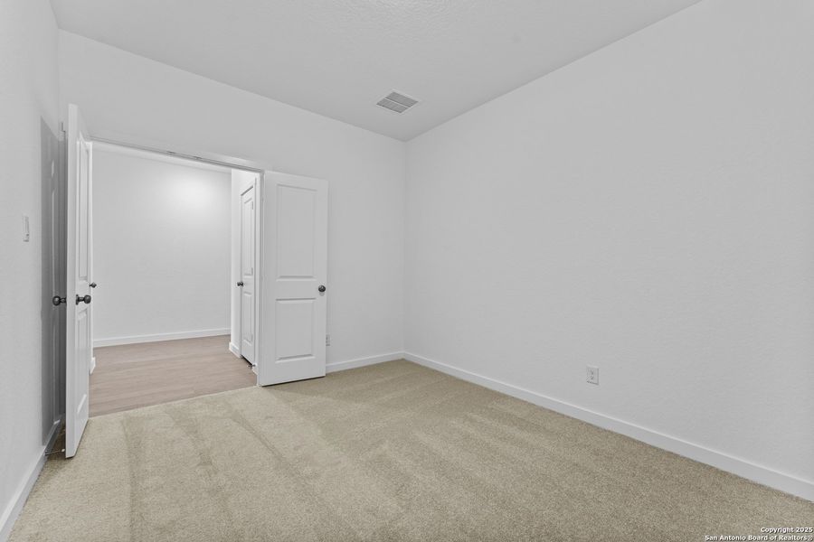Spacious, unfurnished interior of a new home in Hidden Trails: Coastline Collection, Bulverde (Image 26).