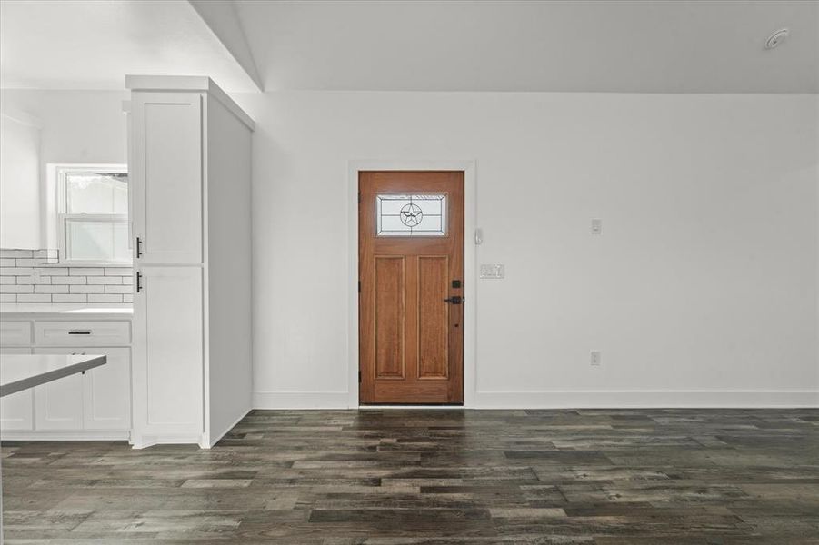 Foyer featuring dark hardwood / wood-style flooring