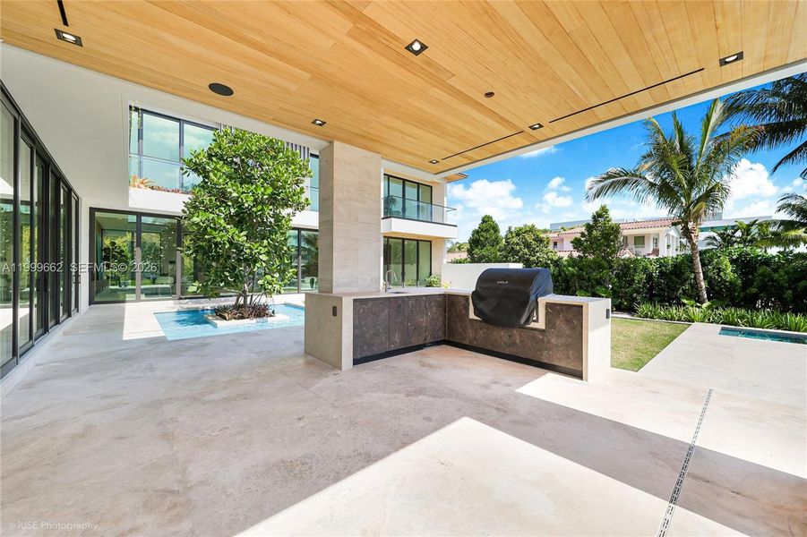 Exterior details and patio area of a home in , Miami (Image 21). Exterior details and patio area of a home in , Miami (Image 21).