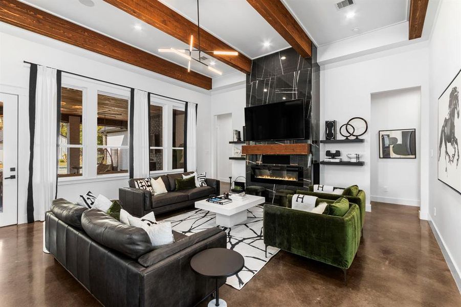 High ceilings, modern finishes and open floor plan to welcome this living space.