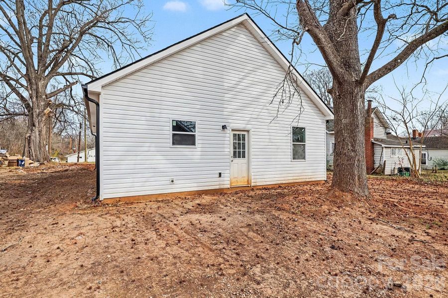Exterior details and patio area of a home in , East Spencer (Image 16).