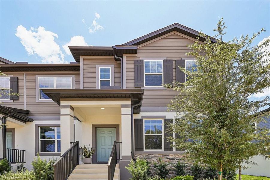 Front exterior of a new home in , Winter Garden, FL, highlighting curb appeal (Image 27).