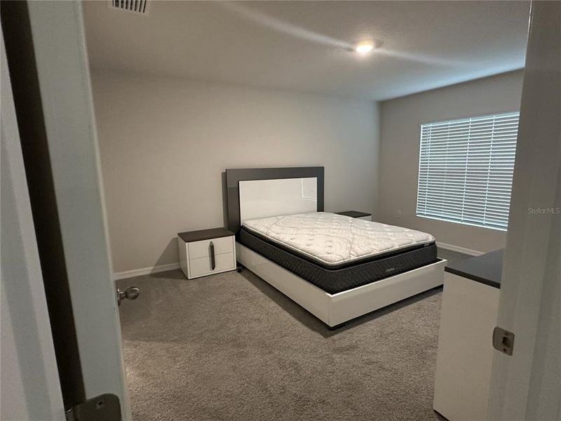 Furnished interior view inside a new home in Silverstone North, Palmetto (Image 17).