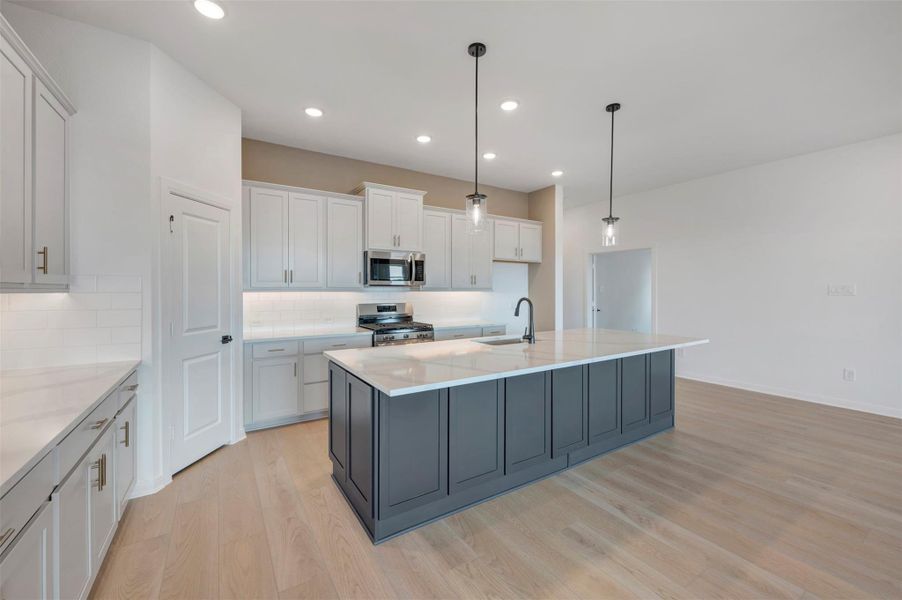 Furnished interior view inside a new home in The Grand Prairie 50’, Hockley (Image 13).