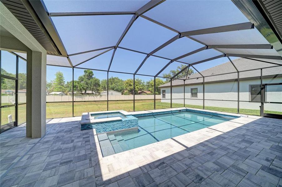 Exterior details and patio area of a home in Hidden Lakes, Brandon (Image 25).