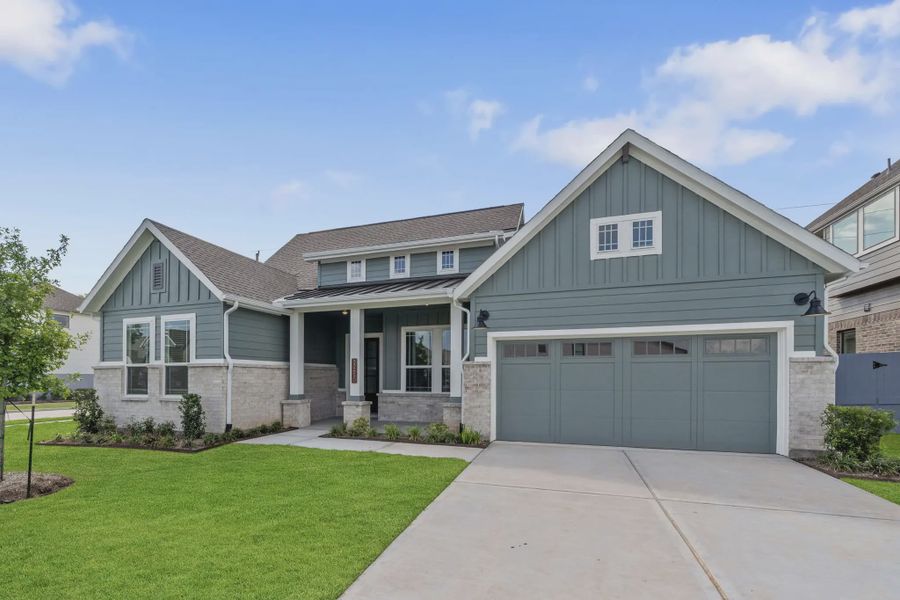 Representative exterior photo of a completed home built from the Malibu by Chesmar Homes in Fulshear Lakes, Fulshear, TX (Image 19).