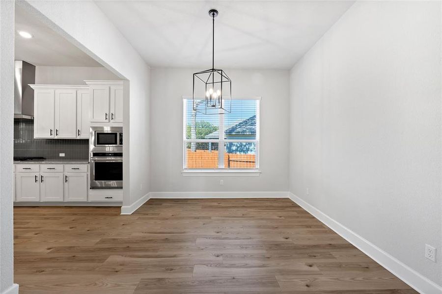 The dining area is open to both kitchen and entertaining areas, allowing a great flow from room to room.