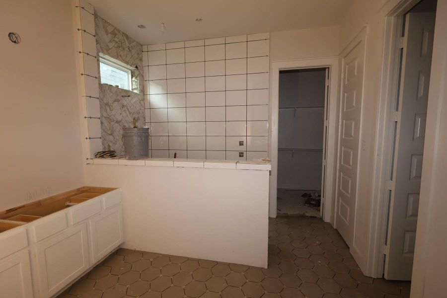 In-progress construction of a new home in Bridgeland Central: Emerald Heights - Enclave Row Collection, Cypress, TX (Image 3).