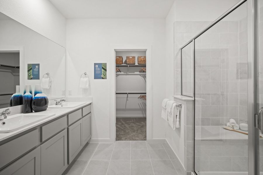 Primary Bath in the Oak home plan by Trophy Signature Homes – REPRESENTATIVE PHOTO