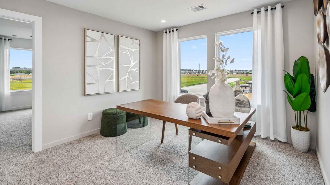 Furnished interior view inside a new home in Grand West, Houston (Image 6). Furnished interior view inside a new home in Grand West, Houston (Image 6).