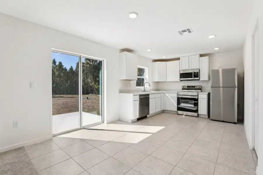 Representative furnished interior of a home built from the Poinsettia by Maronda Homes in Palm Bay, Palm Bay (Image 6).