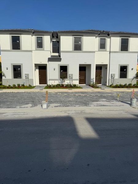 Front exterior of a new home in , Florida City, FL, highlighting curb appeal (Image 17).