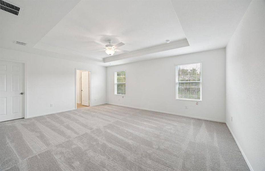 Spacious owner's suite with private bath