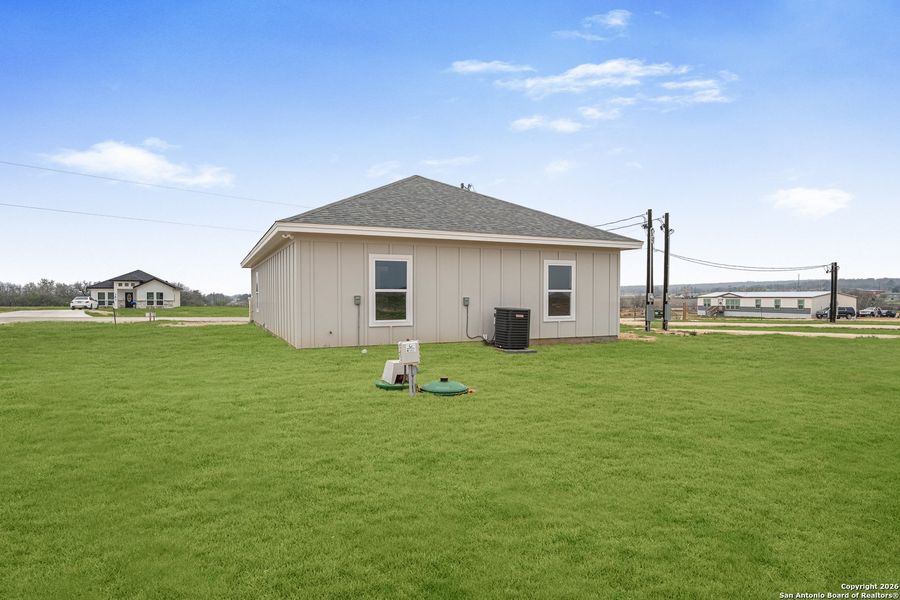 Exterior details and patio area of a home in , La Vernia (Image 23).
