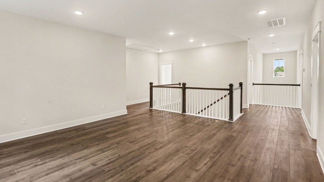 Spacious loft area with access to bedrooms Spacious loft area with access to bedrooms