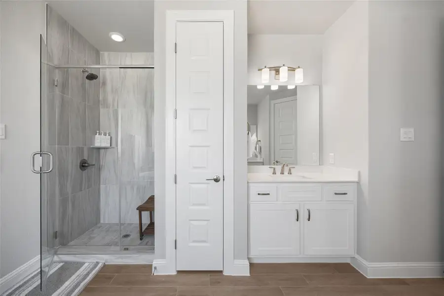 Furnished interior view inside a new home in Double Eagle Ranch, Cedar Creek (Image 9).
