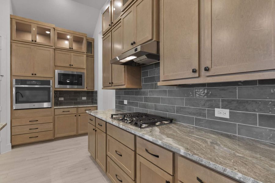 Representative furnished interior of a home built from the Summerton 50′ by Chesmar Homes in Prominence, San Antonio (Image 6). Representative furnished interior of a home built from the Summerton 50′ by Chesmar Homes in Prominence, San Antonio (Image 6).