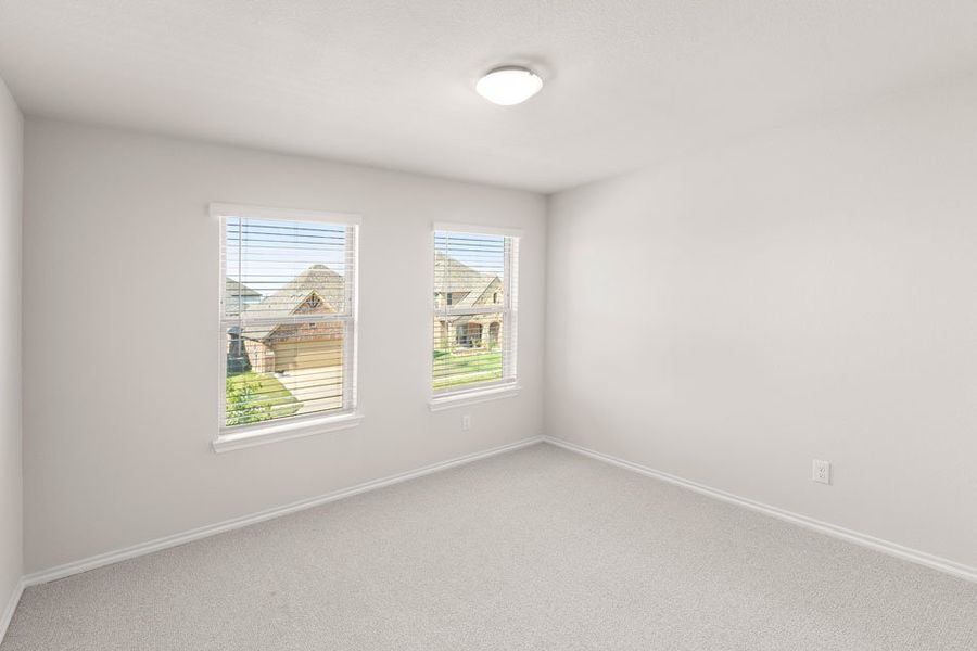 Front exterior of a new home in DeBerry Reserve, Royse City, TX, highlighting curb appeal (Image 2). Front exterior of a new home in DeBerry Reserve, Royse City, TX, highlighting curb appeal (Image 2).