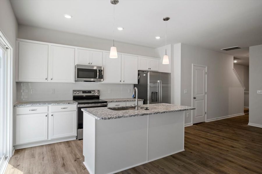 Furnished interior view inside a new home in West Main Townhomes, Sanford (Image 8).