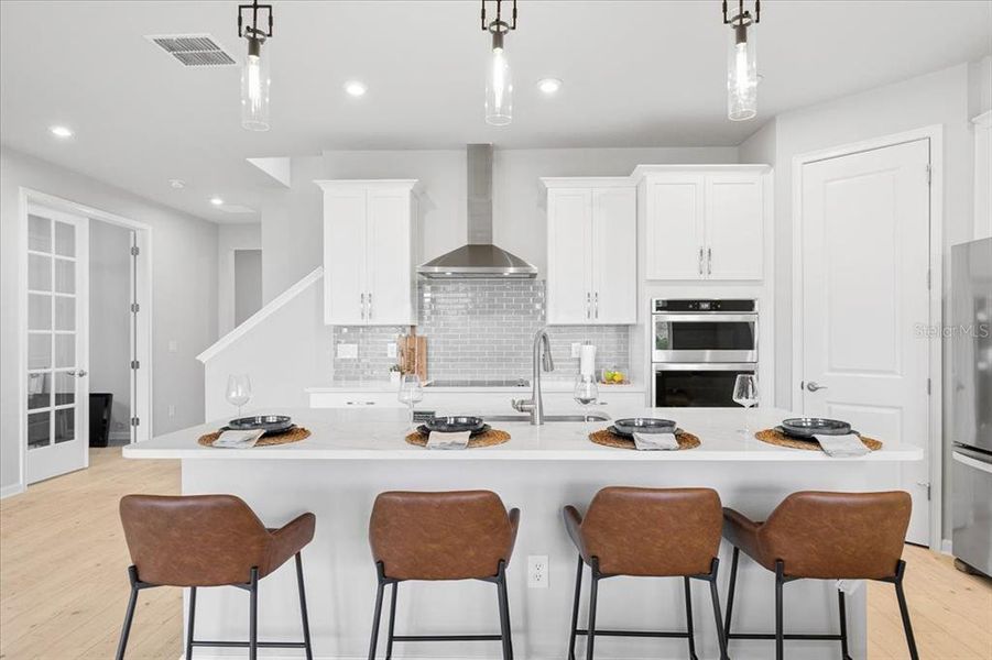 Furnished interior view inside a new home in Sunstone at Wellen Park, Venice (Image 18).