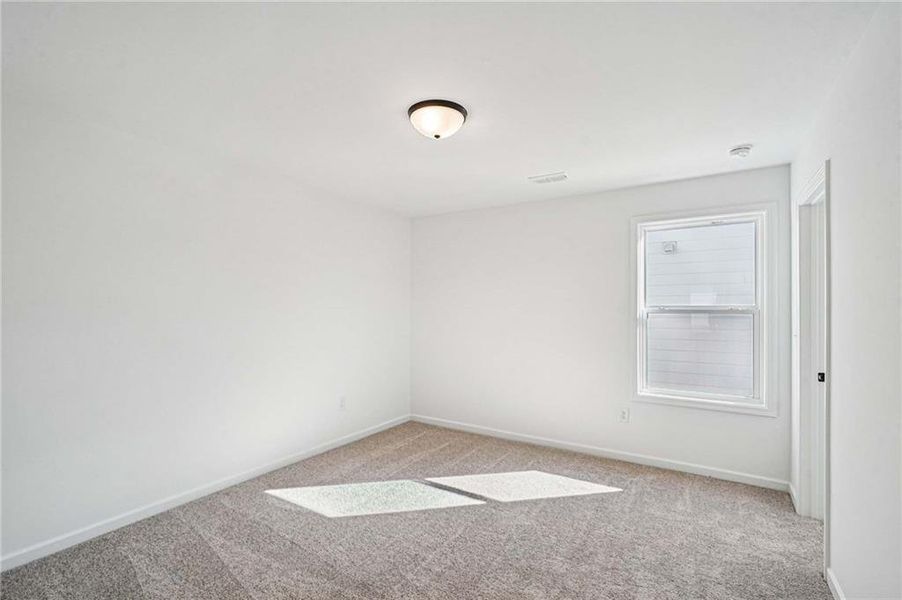 Spacious, unfurnished interior of a new home in Eastlyn Crossing - Single Family, Flowery Branch (Image 28). Spacious, unfurnished interior of a new home in Eastlyn Crossing - Single Family, Flowery Branch (Image 28).