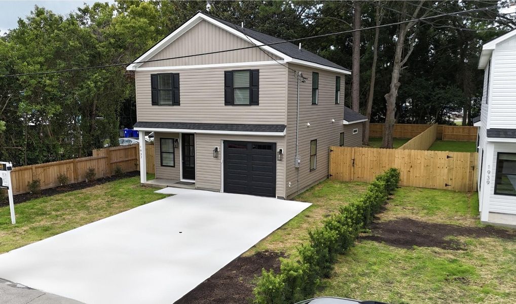 Front exterior of a new home in , North Charleston, SC, highlighting curb appeal (Image 24).