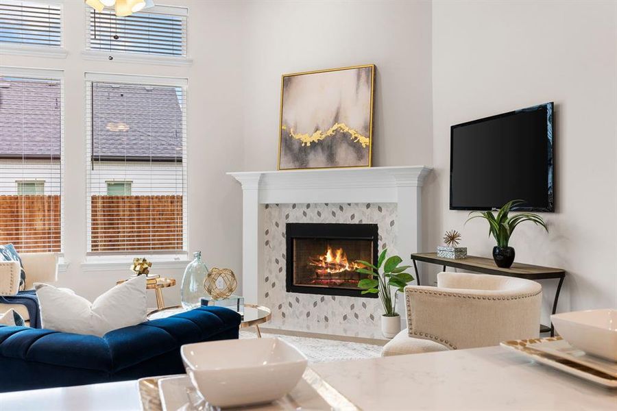 Living room with a tile fireplace