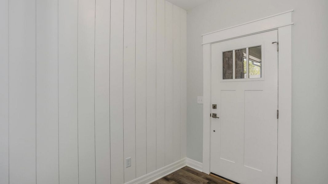 Representative unfurnished interior of a home built from the Portico Tandem Garage by Perfection Builders in The Courtyards at The Heritage, Andover (Image 24).