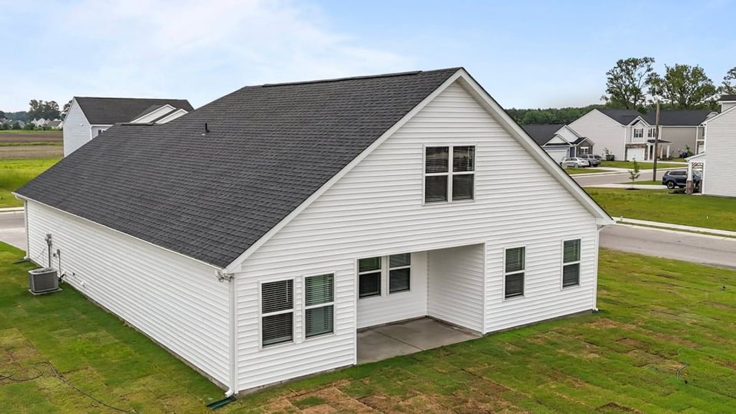 Exterior details and patio area of a home in East Ridge, Ayden (Image 3).