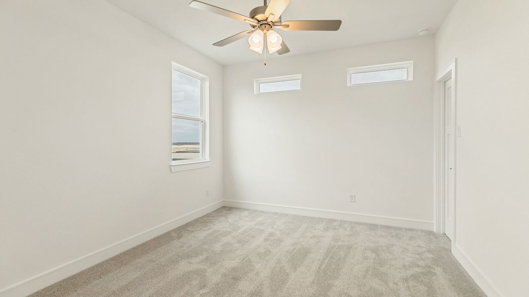 Representative furnished interior of a home built from the Valencia by Brightland Homes in Bridgeland Central, Cypress (Image 24).