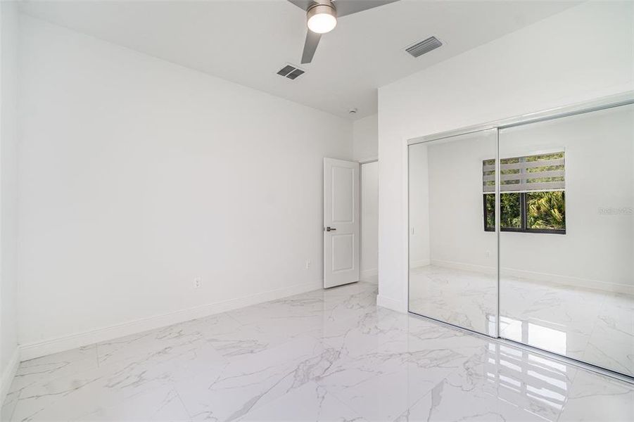 Spacious, unfurnished interior of a new home in , Port Charlotte (Image 22).
