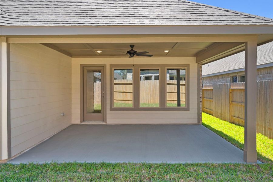 Exterior details and patio area of a home in Grand Central Park, Conroe (Image 4).