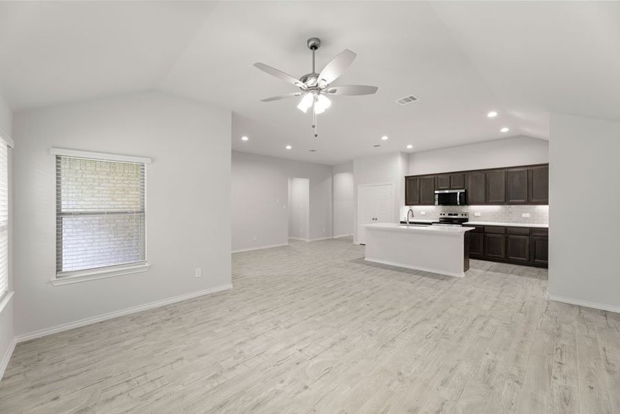 Representative exterior photo of a completed home built from the Boston by Impression Homes in Keeneland, Aubrey, TX (Image 5).