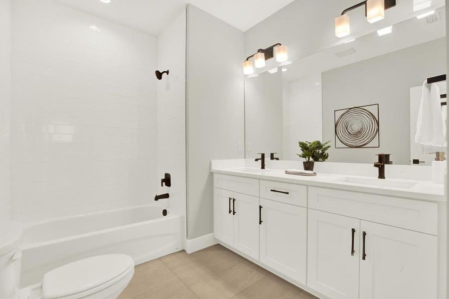 Furnished interior view inside a new home in The Towns At Long Bayou, Seminole (Image 24). Furnished interior view inside a new home in The Towns At Long Bayou, Seminole (Image 24).