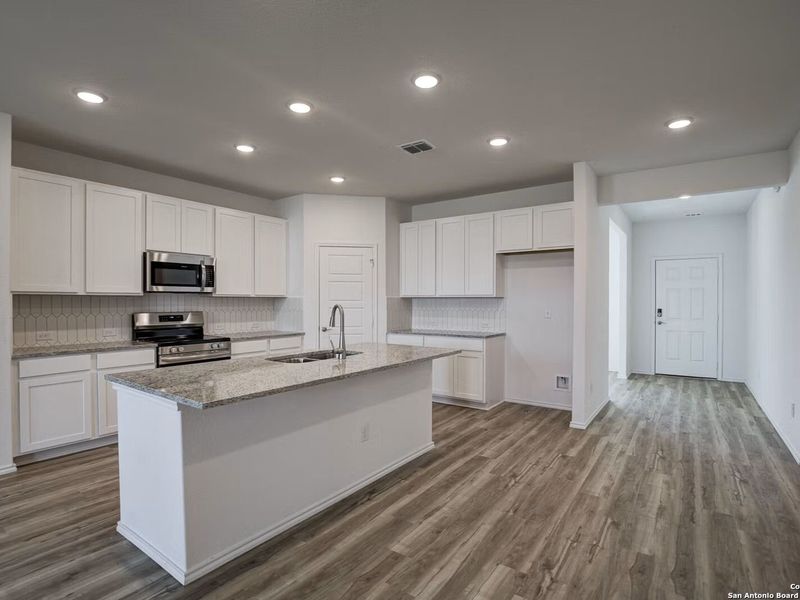 Furnished interior view inside a new home in Hannah Heights, Seguin (Image 5).