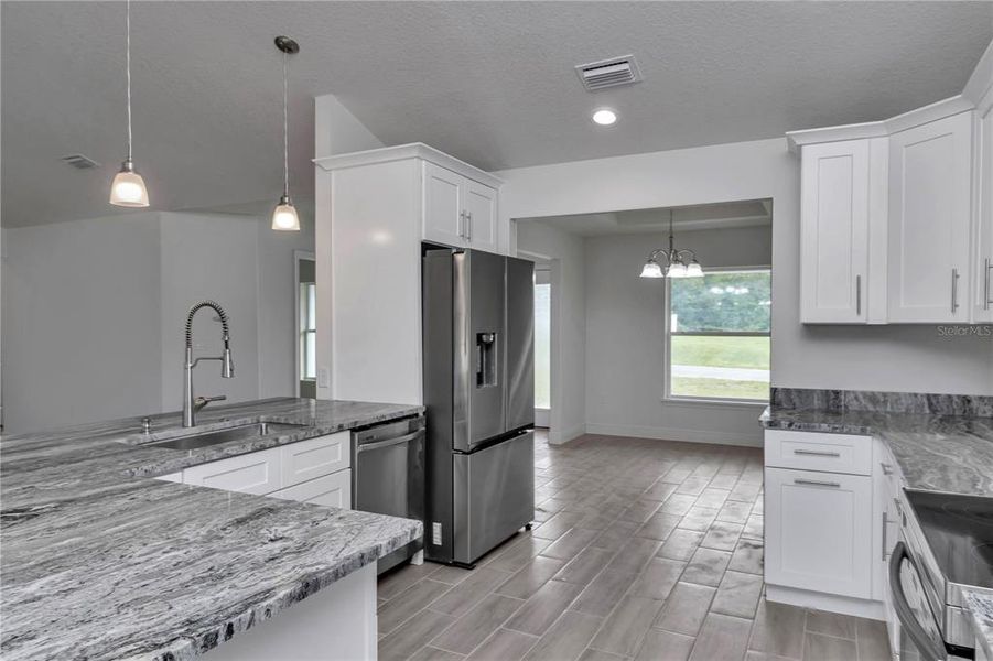 Furnished interior view inside a new home in , Ocala (Image 13).