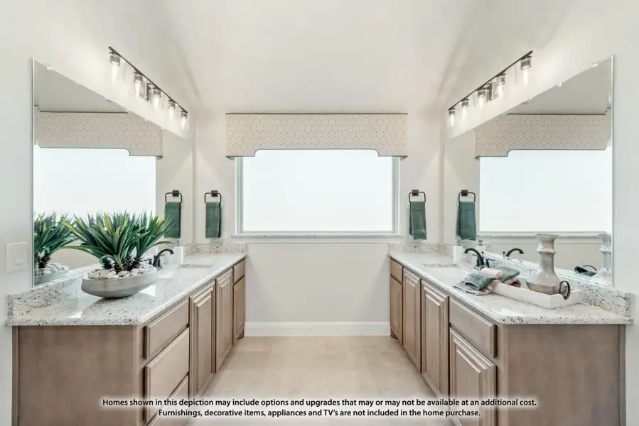 Dual-vanity master bathroom with granite countertops, wood cabinets, and large mirrors with vanity lighting